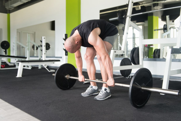 Почему при становой тяге болит поясница: причины, ошибки в технике выполнения, как исправить